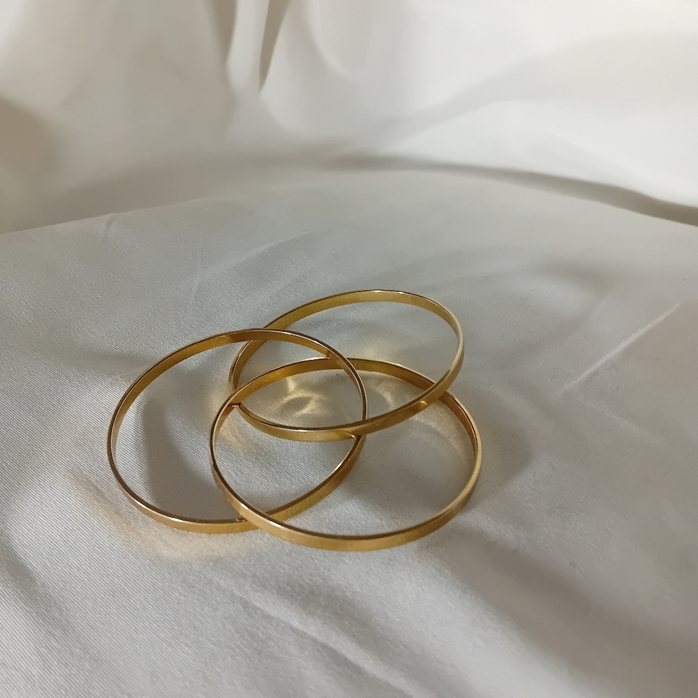 Elegant Gold Tone Bangle Set